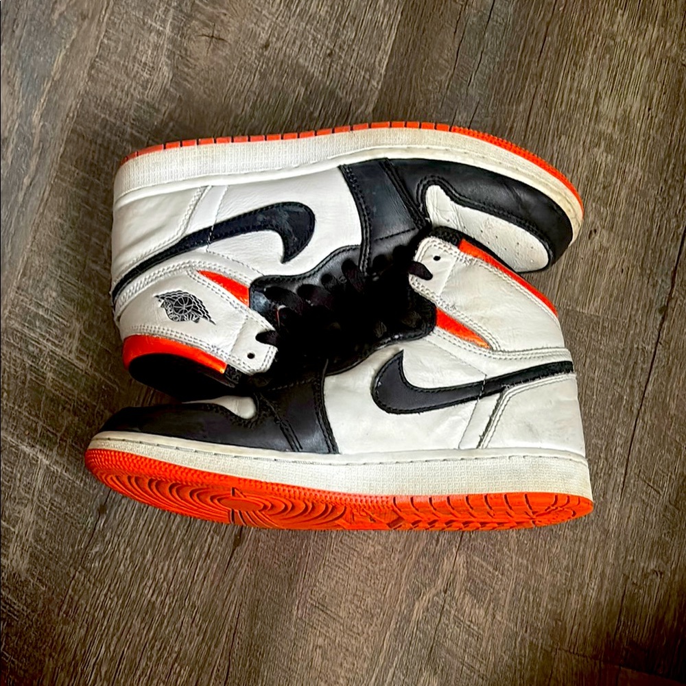 Nike Air Jordan Retro Black and Orange Sneakers